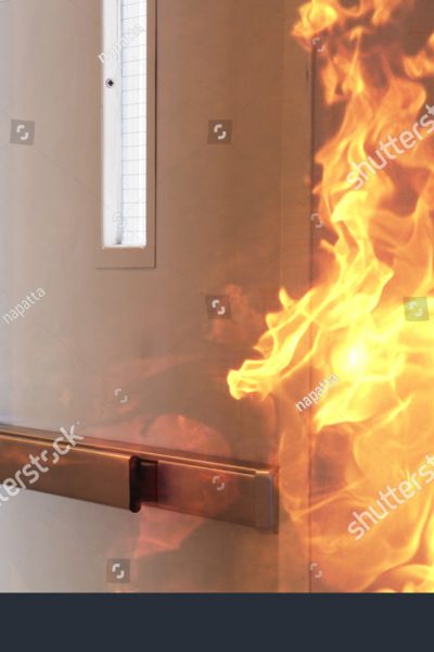 stock-photo-fire-burning-in-front-of-the-closed-door-271704542